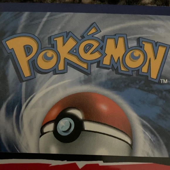 Pokemon Charizard Trading Card - Red and Yellow also has a sleeve - Picture 7 of 9